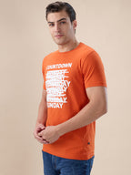 B. Orange Abstract T-Shirt