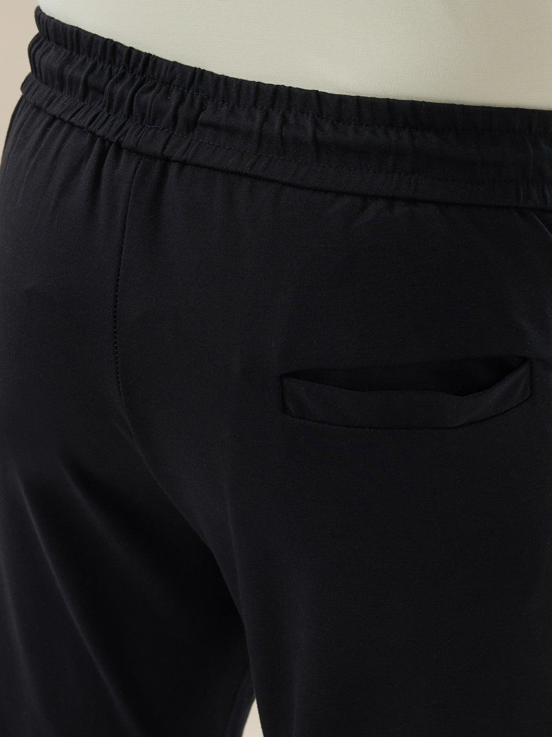 Men’s Solid Regular Fit Track Pants with Four Front Zipper Pockets and One Back Pocket