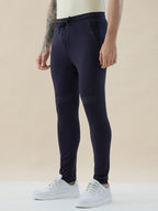 Mens Solid Slim Fit Trackpant with Side Zipper Pockets Drawstring and Knee Print Detail