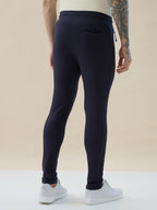 Mens Solid Slim Fit Trackpant with Side Zipper Pockets Drawstring and Knee Print Detail