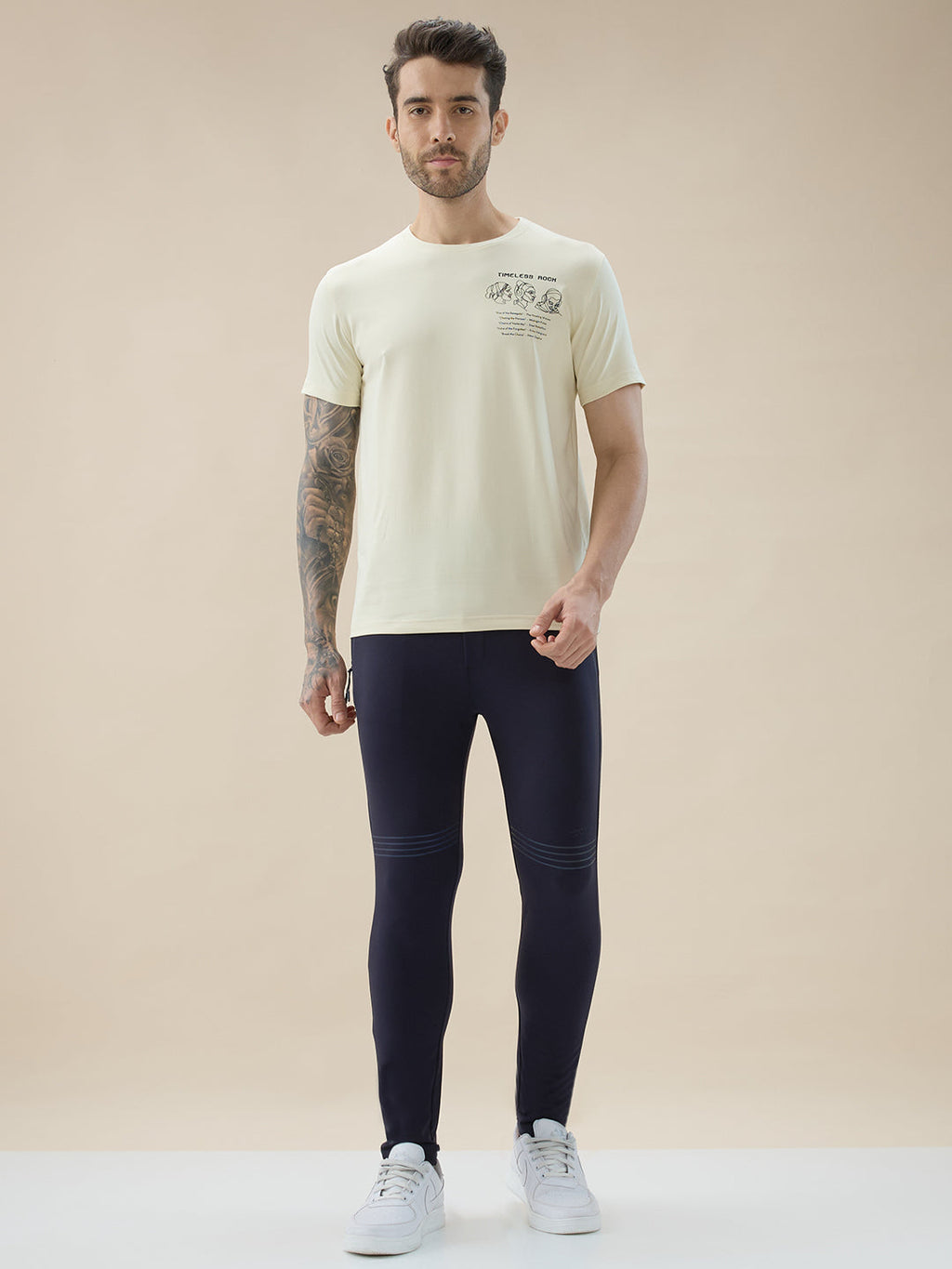 Mens Solid Slim Fit Trackpant with Side Zipper Pockets Drawstring and Knee Print Detail