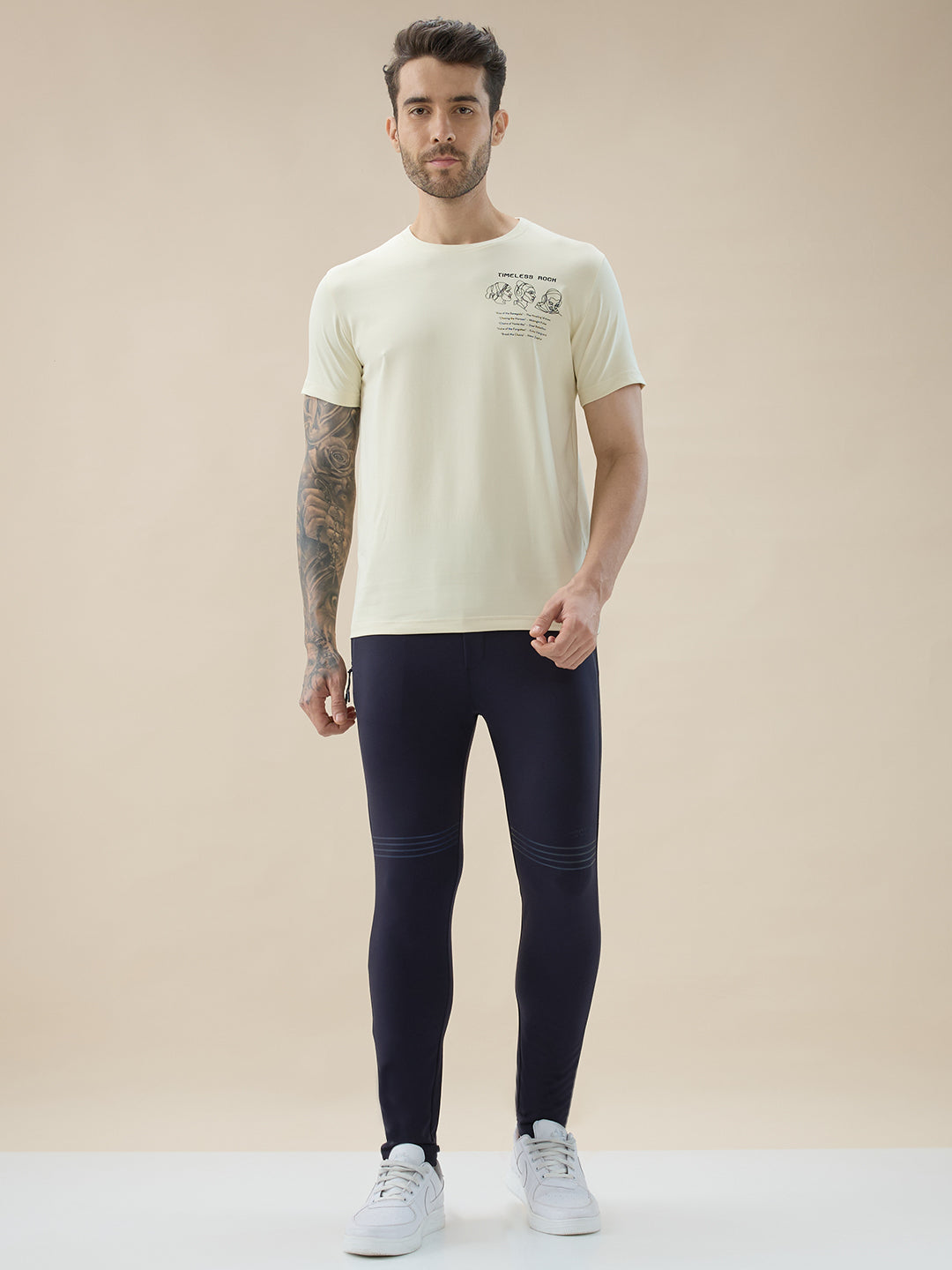 Mens Solid Slim Fit Trackpant with Side Zipper Pockets Drawstring and Knee Print Detail